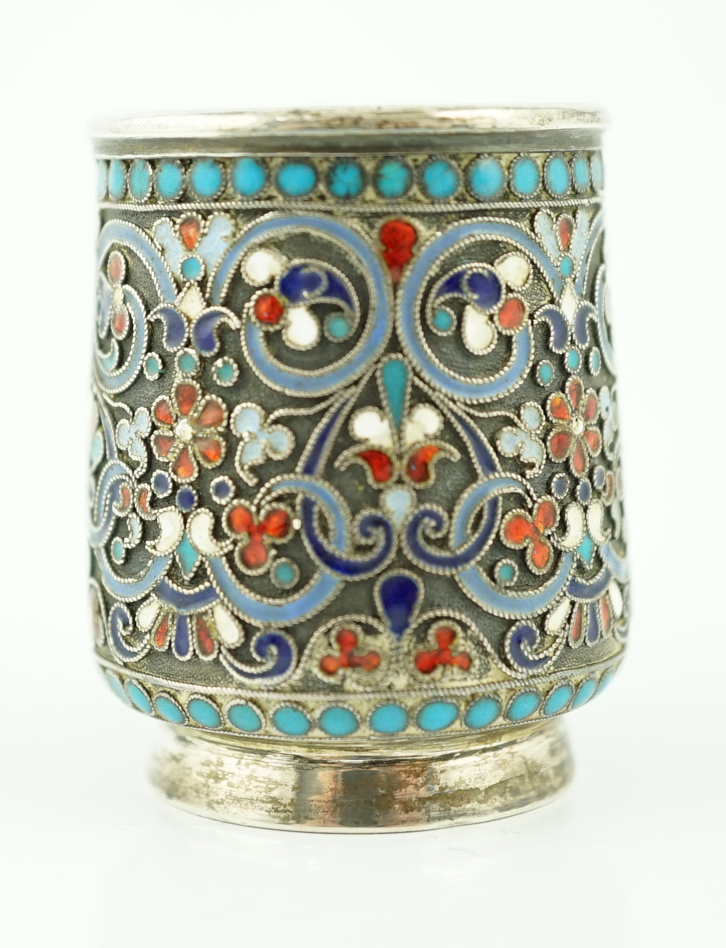 A late 19th century Russian 84 zolotnik silver and cloisonné enamelled handled tot, master Gustav Klingert